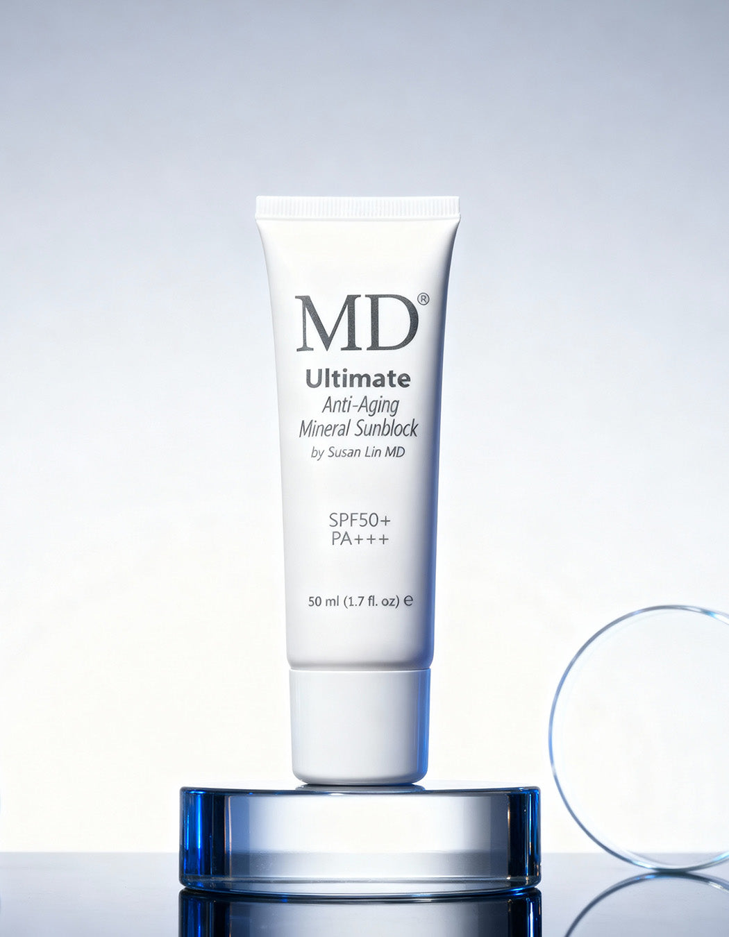 MD Ultimate Mineral Sunblock on display, providing medical-grade broad-spectrum UVA/UVB protection. A physician-formulated, sweat-resistant mineral shield for sensitive skin.